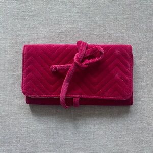 Sezane quilted pink jewelry pouch.